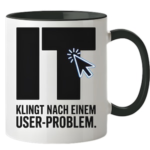 Peut inclure: Mug en céramique blanche avec intérieur et anse noirs. Le mug affiche le mot "IT" en grandes lettres noires, avec une icône de curseur d'ordinateur bleu brillant. En dessous, la phrase "KLINGT NACH EINEM USER-PROBLEM."