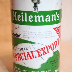 May include: A vintage Heileman's Special Export beer can with a green and white design. The can features the brand name in white lettering and a graphic of a man in a green outfit. Text includes "BREWED AND CANNED ONLY BY G. HEILEMAN BREWING COMPANY LA CROSSE WISCONSIN U.S.A."