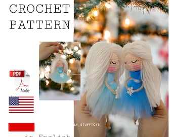 May include: Crochet pattern for two blue and white dressed dolls with blonde hair. The pattern is available in English and Polish. The pattern is a PDF file.