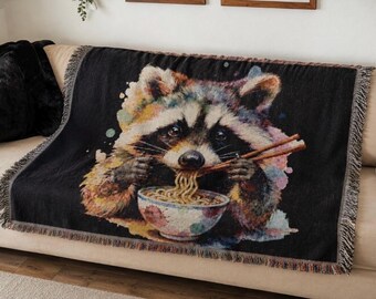 Raccoon Eating Ramen Woven Blanket | Cozy Animal Throw