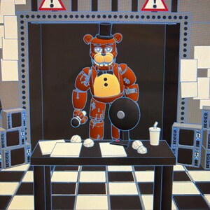May include: A digital 3D model of a brown bear animatronic character with a black top hat, bowtie, and yellow chest patch. The character stands behind a black desk with papers, a fan, and a cup. The background features a black and white chequered floor, two warning signs with exclamation marks, and stacks of electronic equipment.