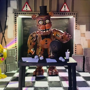 May include: A brown bear animatronic figure with a black top hat and bowtie stands behind a black desk. A yellow chicken animatronic figure is on the left. The scene features a black and white checkered floor, warning signs, and scattered papers.