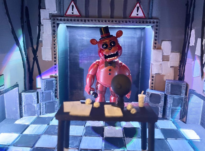 May include: A red bear-like figure wearing a black top hat and bowtie stands in a room with a chequered floor. A dark table in the foreground holds papers, a small globe, and a cup. Two triangular warning signs with exclamation marks are visible.