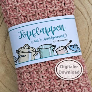 May include: A knitted, pink and white potholder with a label that reads "Topflappen mit handgemacht 100% Baumwolle" and features illustrations of pots and pans. A digital download sticker is also visible.
