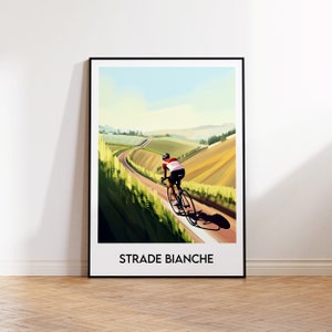 May include: A cyclist rides a bicycle on a winding road through a landscape of rolling hills. The road is lined with trees and the hills are covered in green grass. The sky is blue and the sun is shining. The text "STRADE BIANCHE" is printed at the bottom of the image.