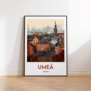 May include: A watercolor illustration of the city of Umeå, Sweden. The illustration features a cityscape with buildings, a church steeple, and trees in autumn colors. The text "UMEA" and "SWEDEN" is printed below the illustration.
