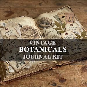 May include: An open book featuring a VINTAGE BOTANICALS JOURNAL KIT with sepia-toned pages, floral illustrations, and paper tags labeled Vintage Rose, Old World Poppy, Botanical Hydrangea, Heirloom Peony, Gardenia Bloom, and Wild Iris.