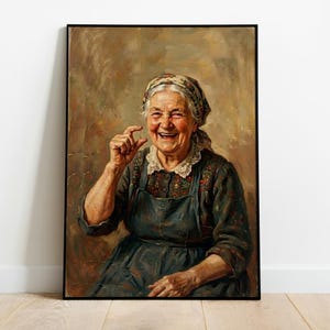 May include: A framed oil painting depicting an elderly person with a headscarf, wearing a dark patterned blouse and apron with a white lace collar. The person is smiling and holding their thumb and index finger together in a small gesture.