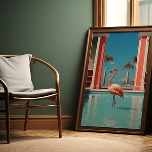 May include: A framed print of a pink flamingo standing in a pool of water. The pool is surrounded by red pillars and palm trees. The print is hanging on a wall in a room with a wooden chair and a green wall.