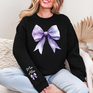 Personalized Bow Sweatshirt, Custom Name on Sleeve Hoodie, Purple Watercolor Bow Design, Unisex Casual Wear