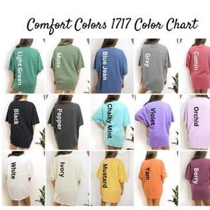 The image is a color chart displaying various comfort colors, including green, blue, gray, pink, black, white, yellow, purple, orange, and pink.