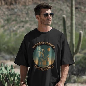 Best Dad in the Galaxy T-Shirt – Funny Astronaut Father’s Day Gift – Space Dad Tee from Son or Daughter – Sci-Fi Dad Graphic Shirt