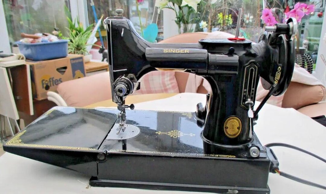 Singer Portable Electric Sewing Machine No. 221K1 and Lots of Etsy