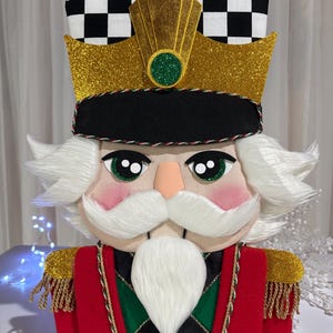 Adorno de lujo con forma de busto de cascanueces para guirnalda, ideal para la decoración navideña tradicional. Colgante para puerta. Exclusivo diseño de zinnias silvestres.