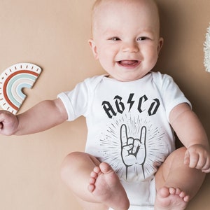 Abcd onesie best sale