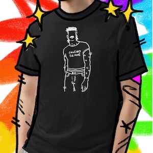 Koszulka Badlands Pride – Gay Streetwear Graphic Tee, Masc for Masc Queer Top, Ręcznie rysowana alternatywna koszulka LGBTQ, Moda Pride 2025