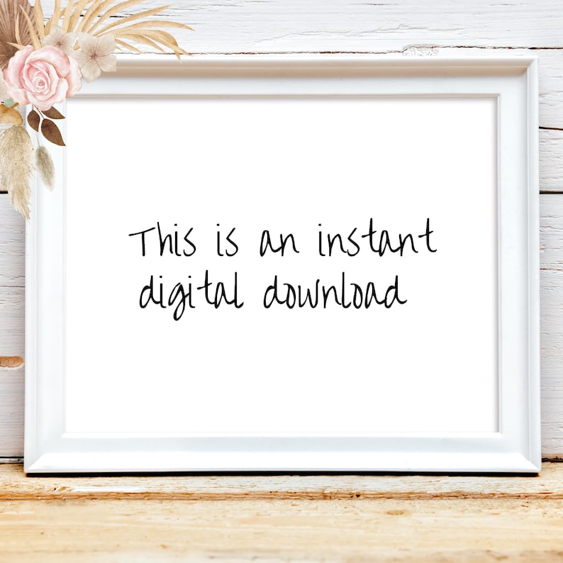 May include: A white framed print with the text "This is an instant digital download" in black script. The frame is on a wooden surface, with floral and dried plant accents in the upper left corner.