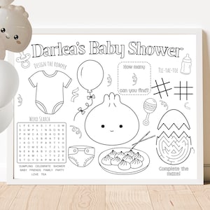 May include: A black and white printable baby shower game with activities like designing a onesie, a word search, a tic-tac-toe game, a maze, and a 'how many can you find' game. The theme is a baby shower with a dumpling design.