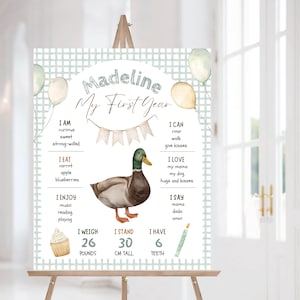 Modèle de tableau modifiable pour le premier anniversaire d'un Lucky Duck | Poster Un caneton porte-bonheur, affiche de la première année de bébé imprimable