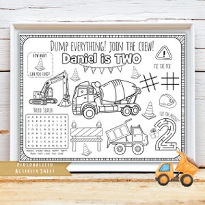 May include: A black and white printable activity sheet for a child's birthday party. The sheet features a construction theme with a dumper truck, cement mixer, and excavator. The sheet includes a word search, a maze, and a noughts and crosses game. The text on the sheet says "Dump Everything! Join the Crew! Daniel is Two."