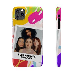 May include: A colorful phone case with a photo of four friends and the text "Best Friends Forever". The case has a yellow, pink, blue, and green abstract design.
