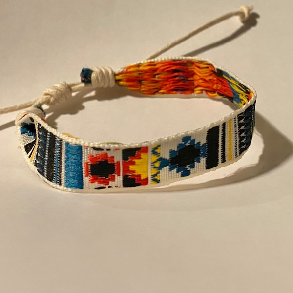 Beautiful colorful Boho braided and embroidered cotton bracelet for men and women. Handmade, adjustable sliding knot.