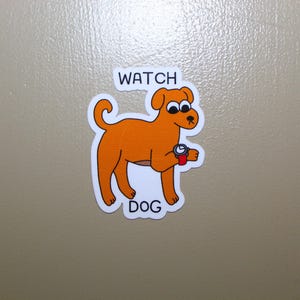 May include: A sticker of an orange dog wearing a watch with the words "WATCH DOG" printed below.
