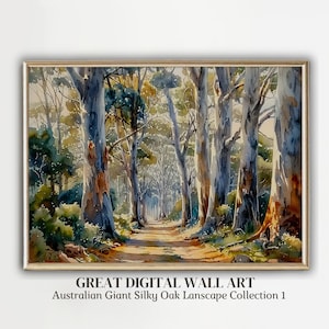 May include: A watercolor painting of a path through a forest of tall, slender trees. The trees are a light blue-gray color with hints of brown and green. The path is a light brown color and leads to a clearing in the distance. The painting is framed in a light wood frame.