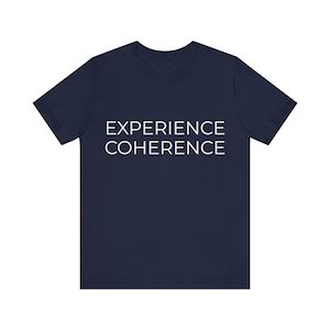 May include: Navy blue t-shirt with the words "EXPERIENCE COHERENCE" printed in white, centered on the front. The shirt has short sleeves and a crew neck.