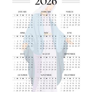 May include: 2026 calendar featuring a light blue illustration of a religious figure with a halo. The calendar displays the months January through December with dates in a simple, readable format.