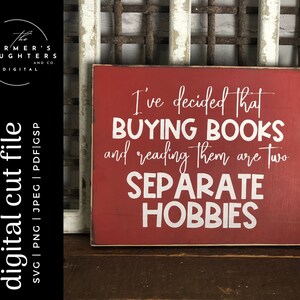 Könnte beinhalten: Rotes Holzschild mit weißem Text, der lautet: "Ich habe beschlossen, dass BUCHKAUF und Lesen zwei GETRENNT HOBBIES sind."