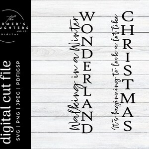 May include: Black and white text on a white wood background. The text reads "Walking in a Winter Wonderland" and "It's beginning to look a lot like Christmas".