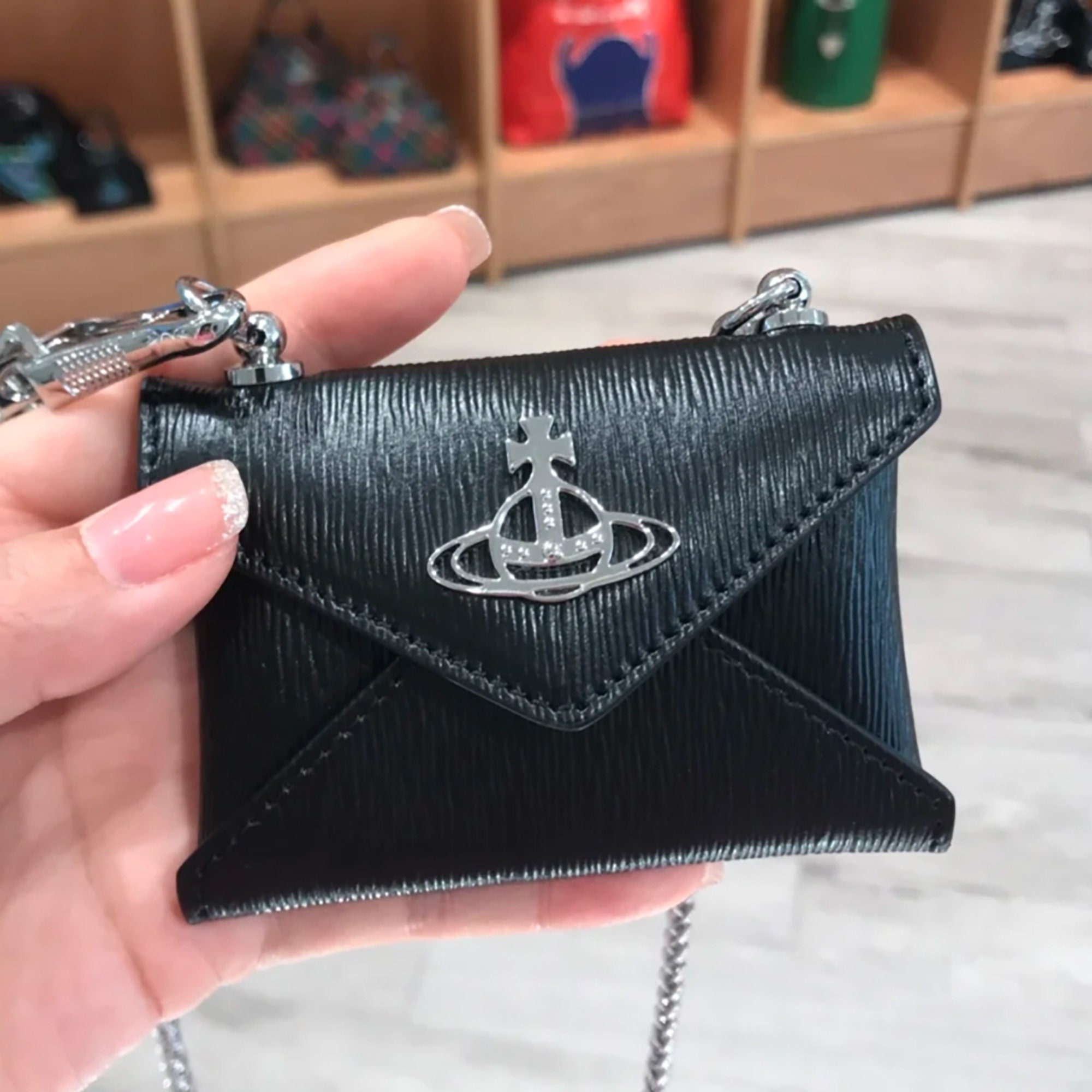 River Island is selling a £310 Vivienne Westwood bag 'dupe' - and