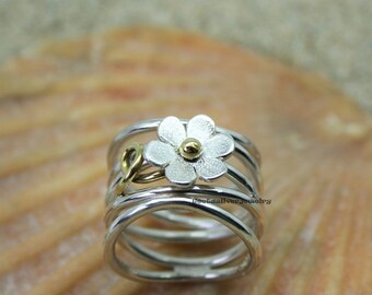 Liten ring i sterlingsilver i massivt 925-format med blommönster