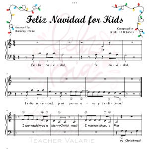 May include: Sheet music for "Feliz Navidad for Kids" by Jose Feliciano, arranged by Harmony Centre. The music includes lyrics and musical notes, with the words "I wanna wish you a Merry Christmas" visible. Colorful Christmas lights decorate the top.