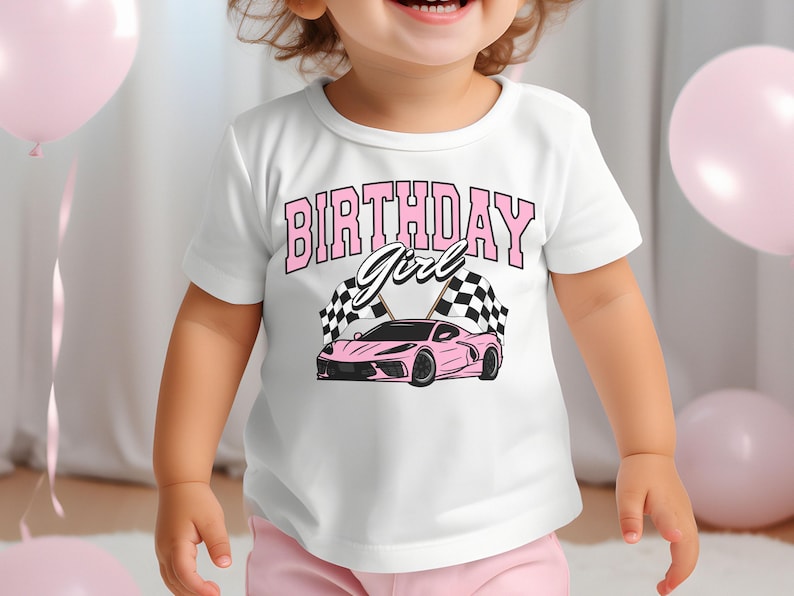 May include: A white t-shirt with a pink race car graphic and the text "Birthday Girl" in pink letters.