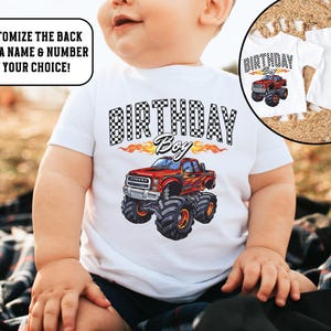 Pu&ograve; includere: Body bianco a maniche corte con una grafica di un camion mostro rosso e il testo "Birthday Boy" in font a scacchi bianco e nero. Il camion ha delle fiamme che escono dallo scarico.