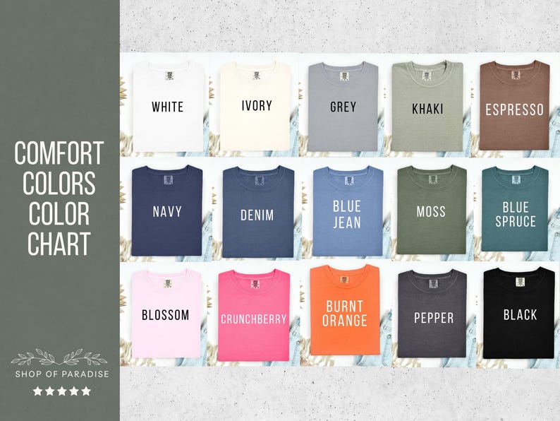Puede incluir: Una carta de colores que muestra camisetas Comfort Colors en varios tonos. Las camisetas est&aacute;n dispuestas en filas y columnas, mostrando colores como blanco, marfil, gris, caqui, marino, denim, azul vaquero, musgo y negro. El texto "Comfort Colors Color Chart" es visible.