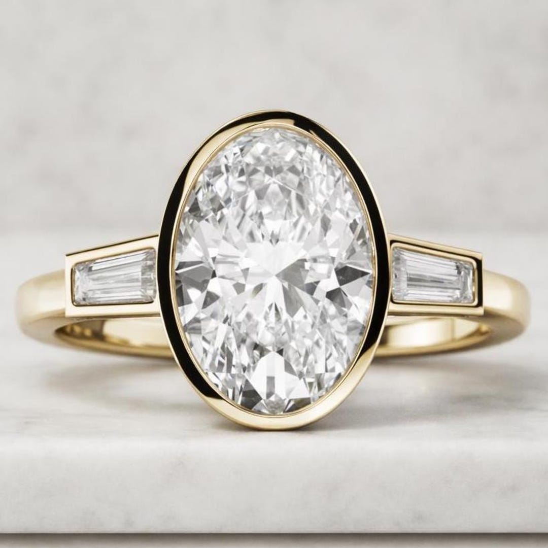 Oval Lab Grown Diamond Bezel Set Engagement Ring, Yellow Gold Baguette ...
