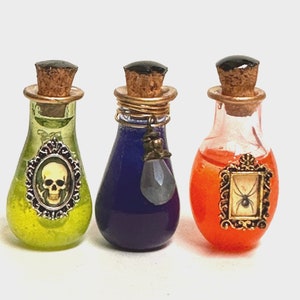 Miniature Haunted Potion Bottles – Set of 3 Spooky 1:12 Scale Jars for Witchy Dollhouse, Apothecary or Gothic Decor, creepy decorated minis