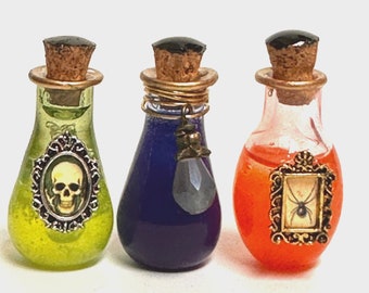 Miniature Haunted Potion Bottles – Set of 3 Spooky 1:12 Scale Jars for Witchy Dollhouse, Apothecary or Gothic Decor, creepy decorated minis