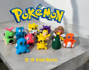 Set of 12 Pokemon. Bulbasoura, Caterpie, Charmander, Digless, Gengar, JigglyPuff, Metapod, Pikachu, Psyduck, Squirtle, Togepi, Flareon.