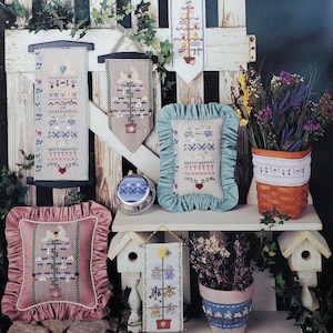 Árboles de plumas de primavera de Mill Hill: folleto con patrones de punto de cruz con cuentas