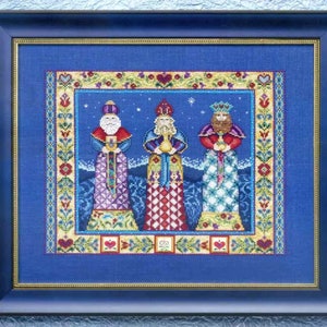 May include: Three Wise Men cross stitch pattern with a blue background and a colorful border. The Wise Men are wearing robes and holding gifts. The pattern is framed in a blue frame.