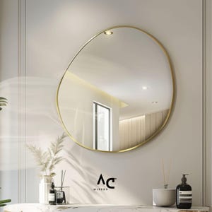 Asymmetrical Round Wall Mirror with Slim Gold Frame for Entryway, Bathroom or Bedroom, Modern Minimalist Irregular Accent Mirror
