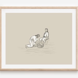 May include: A black and white line drawing of two people. One person is kneeling and washing the other person's feet in a basin.