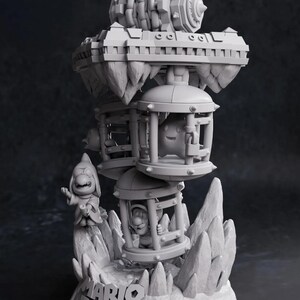 May include: A gray 3D-printed sculpture featuring characters from the Mario Bros. video game. The sculpture includes characters in cages, a floating platform, and the Mario Bros. logo on the base. The sculpture has a detailed, textured design.