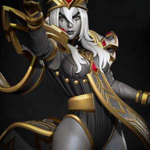 Pode incluir: Figura detalhada de um personagem em um traje cinza escuro e preto com detalhes dourados. O personagem tem cabelo branco, pele pálida e está usando um chapéu com uma joia vermelha. A figura está posando com um braço estendido.