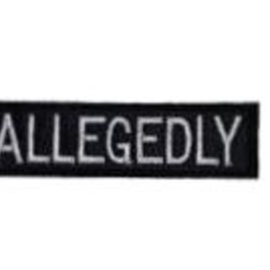 May include: A rectangular black embroidered patch featuring the word ALLEGEDLY stitched in white capital letters. The patch has a clean, straight-edged border and a flat, uniform surface, designed for attachment to fabric items like clothing or bags.