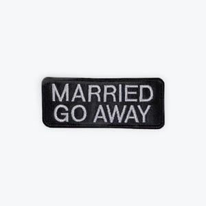 May include: A black rectangular patch with the embroidered text "MARRIED GO AWAY" in white. The patch has a stitched border and is set against a white background.